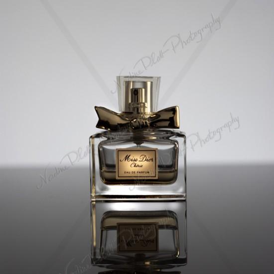Photograph of a Perfume bottle by Nadine Platt