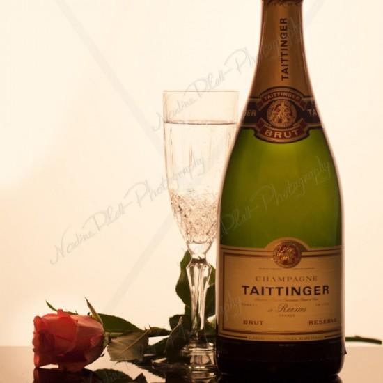 Photograph of Champagne, a Christal glass and Roses by Nadine Platt