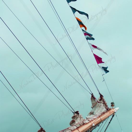 Photograph of Tall Ship Flags by Nadine Platt