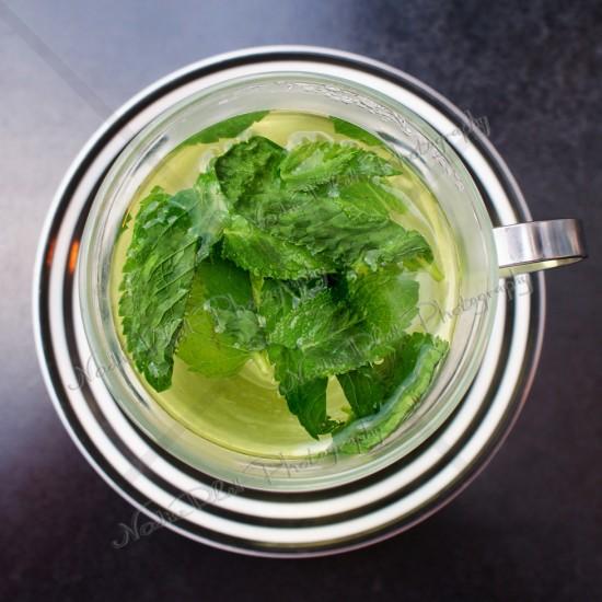 Photograph of Mint tea in a glass cup by Nadine Platt